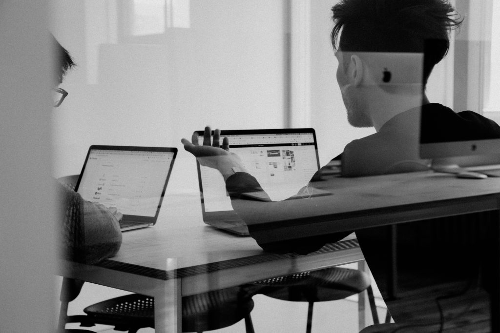 Two men in meetings